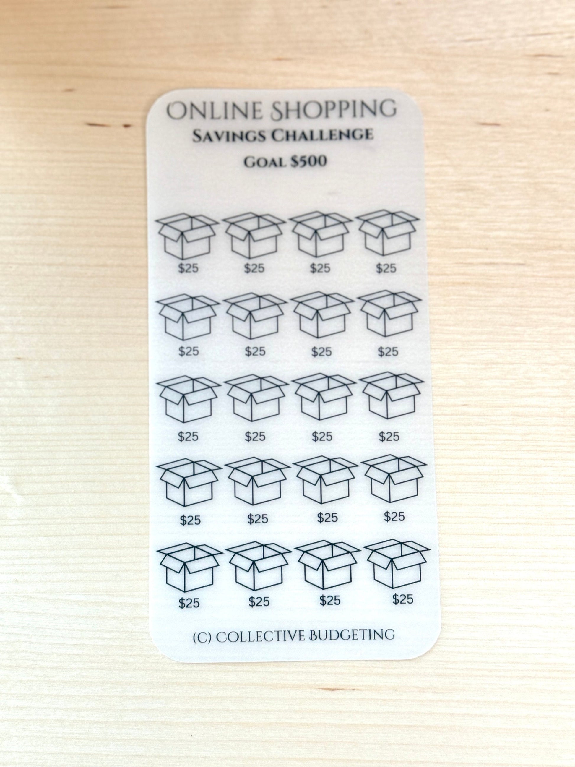 A white printable sticker with the text 'ONLINE SHOPPING SAVINGS CHALLENGE GOAL $500' at the top. The sticker has 20 boxes with the text '$25' in each box. The text '(C) COLLECTIVE BUDGETING' is at the bottom of the sticker.