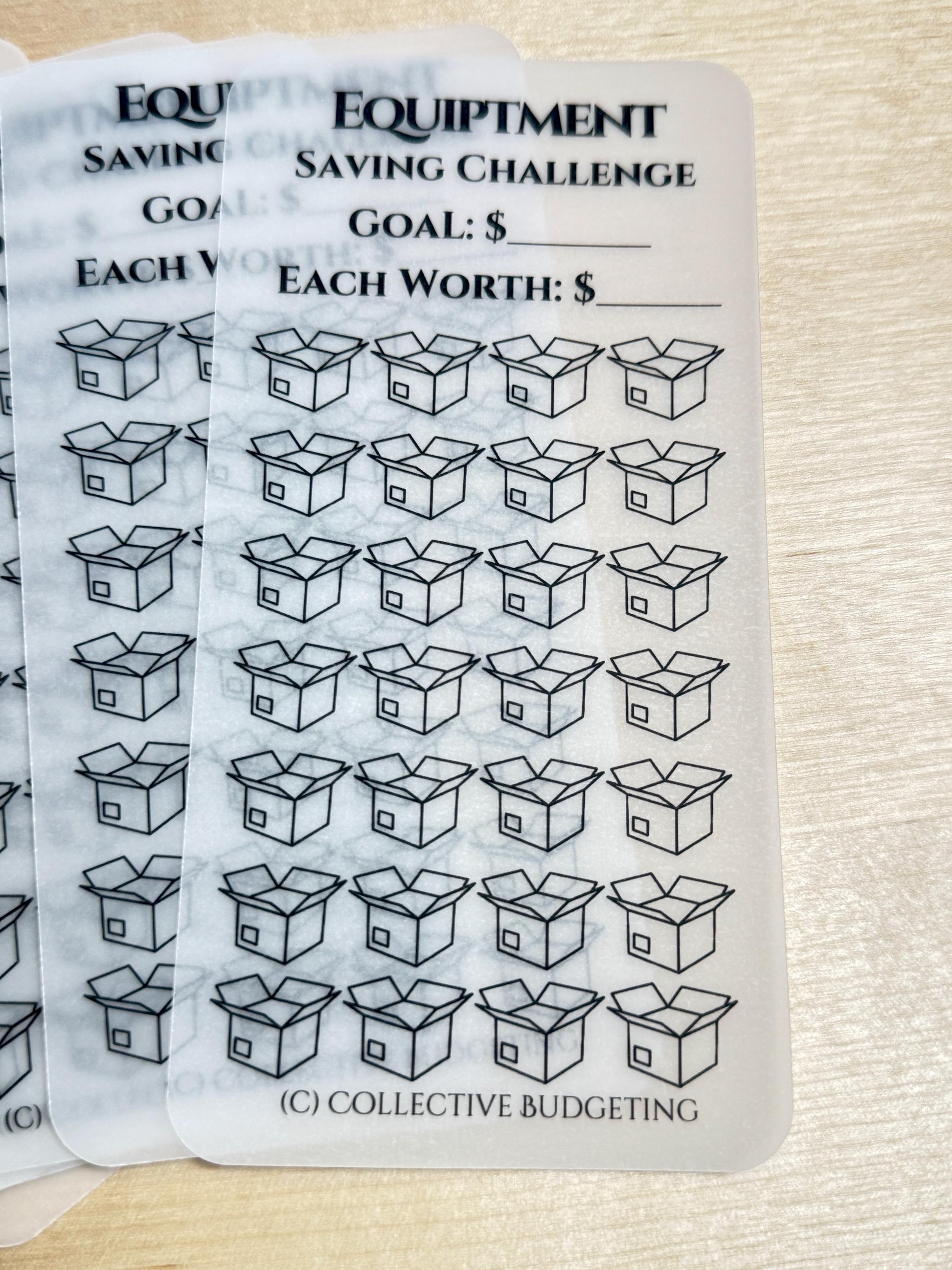 A white printable sheet with a black and white design. The sheet has the text 'Equipment Saving Challenge' and 'Goal: $' at the top. There are 36 boxes with a small square inside each box. The text 'Each Worth: $' is below the boxes. The text '(C) Collective Budgeting' is at the bottom of the sheet.
