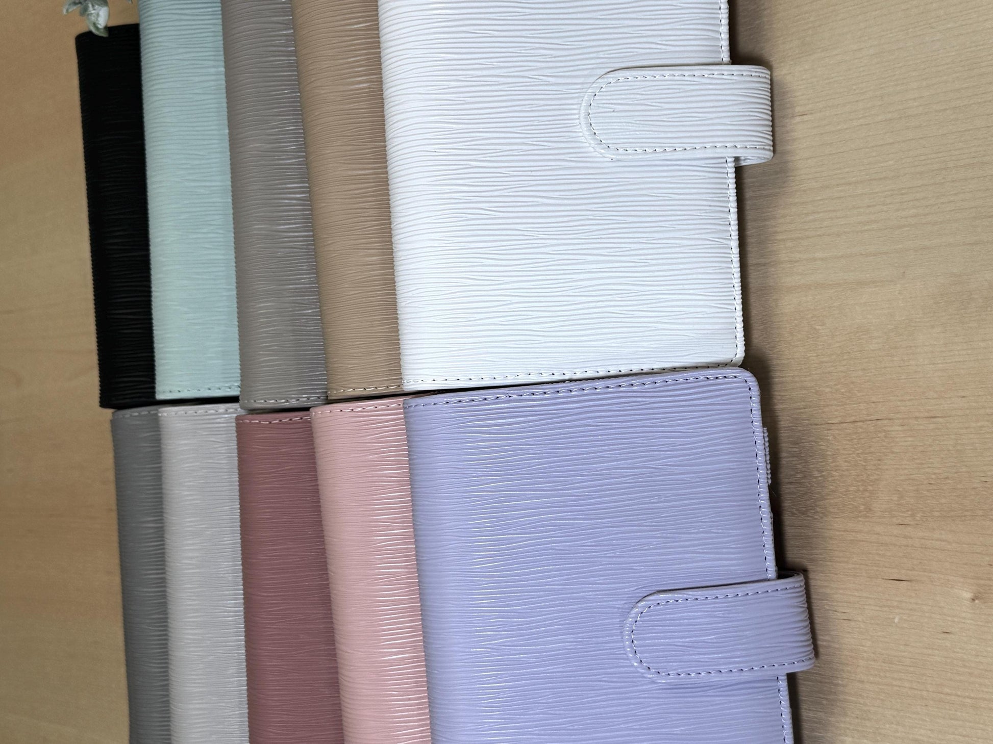 A6 Budget Binder with Silver Rings. Wallet. Cash Stuffing Envelope Wallet. Budget Organizer. Epi. Saffiano. Buckle. Side shot of all 10 colors