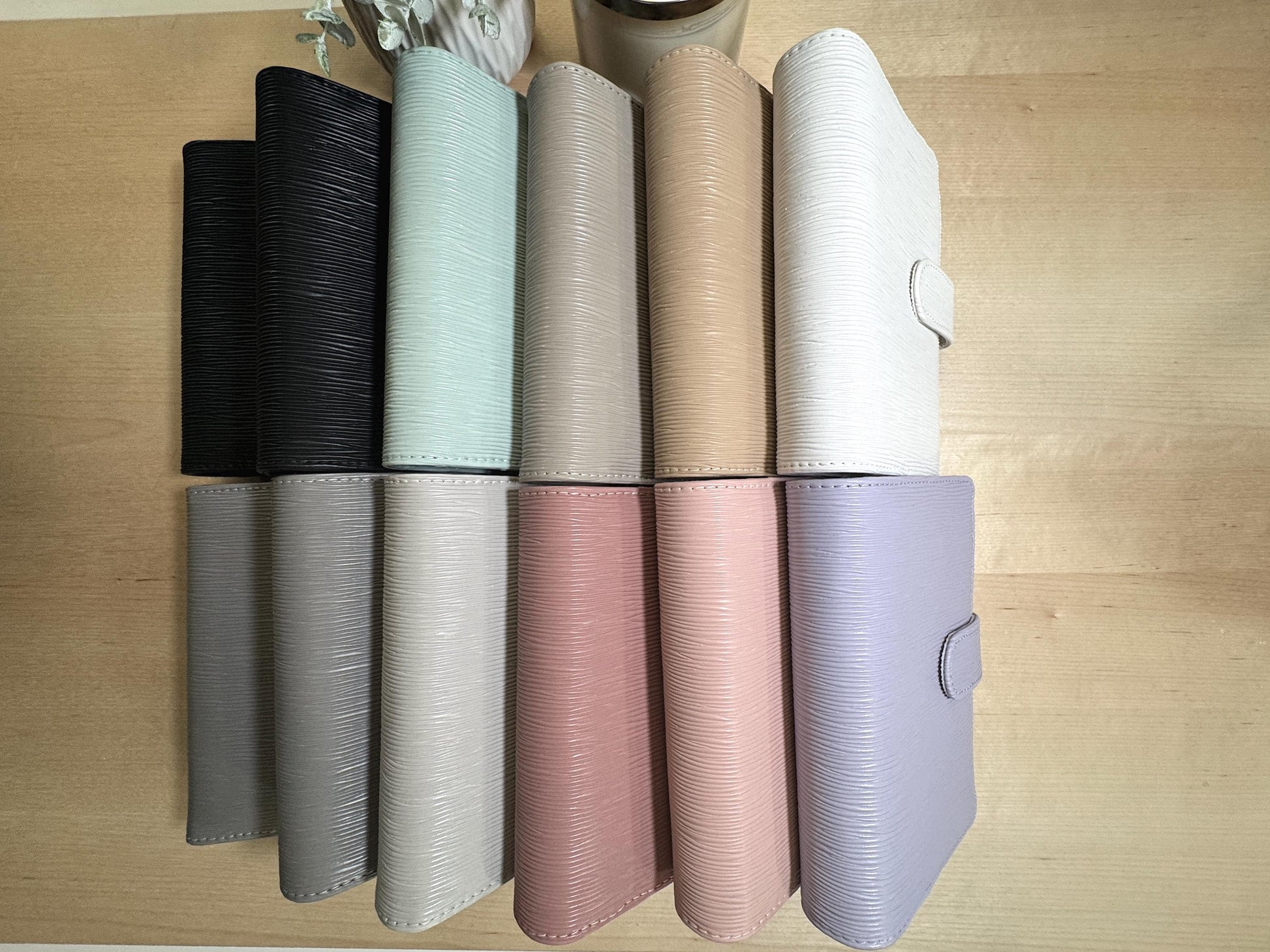 Top view of all 10 coloredA6 Budget Binder with Silver Rings. Wallet. Cash Stuffing Envelope Wallet. Budget Organizer. Epi. Saffiano. Buckle.