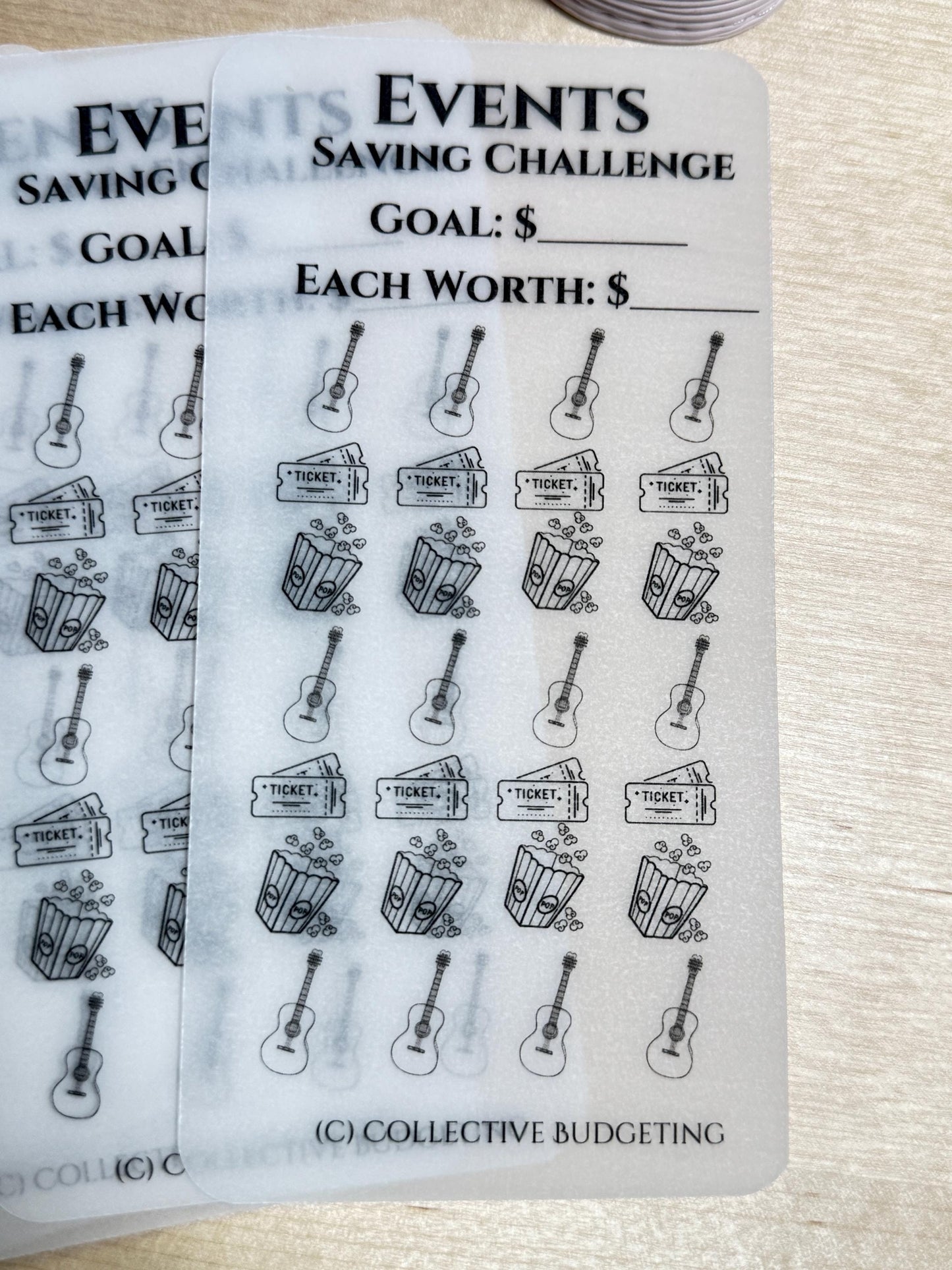 A white sheet with black text and images. The text reads 'Events Saving Challenge', 'Goal: $', 'Each Worth: $', and '(C) Collective Budgeting'. The images are of a guitar, a ticket, and a bucket of popcorn. The sheet is designed to be used as a savings tracker.